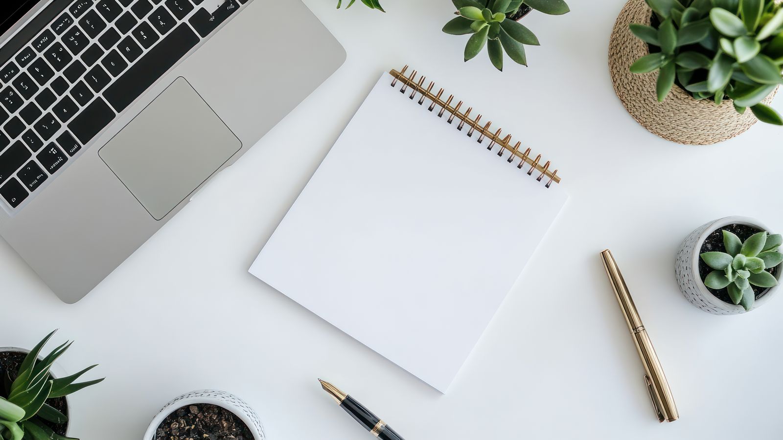Clean desk setup with communication tools and developer workspace